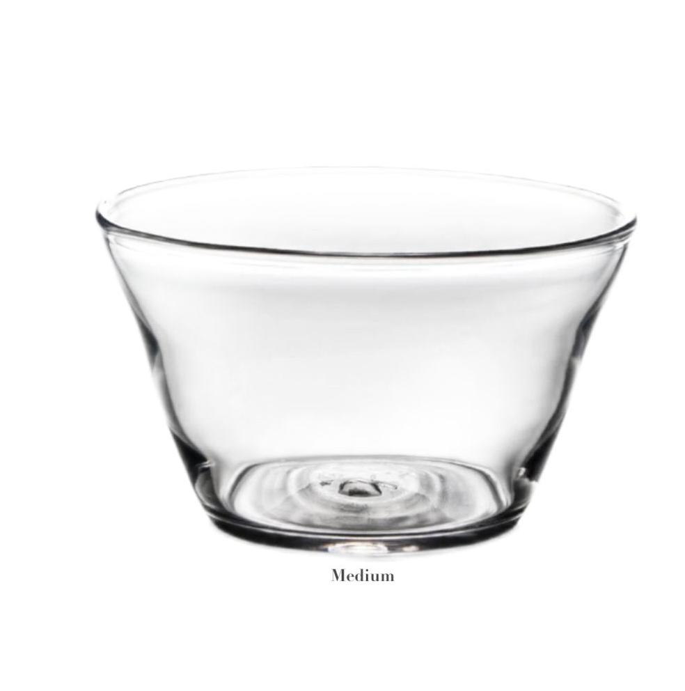 The Simon Pearce Nantucket Bowl Collection features a clear glass medium bowl with a gently flared rim and thick base, ideal as elegant serveware or a stylish centerpiece, shown here against a white background.
