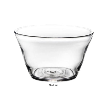 The Simon Pearce Nantucket Bowl Collection features a clear glass medium bowl with a gently flared rim and thick base, ideal as elegant serveware or a stylish centerpiece, shown here against a white background.