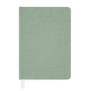 The Sage Tailored Journal by Sugar Paper is a closed, light green hardcover notebook with a fabric texture, featuring a white ribbon bookmark and lined pages for organized writing.