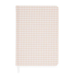 The Pink Gingham Tailored Journal by Sugar Paper features a charming beige and white gingham check cover. Shown closed with a white ribbon bookmark peeking out from the bottom left, this journal offers a durable book cloth hardcover and lined pages for organized note-taking.
