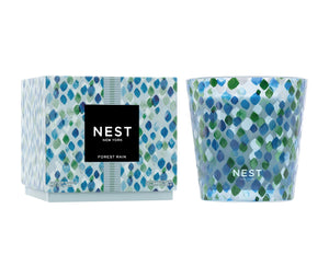 The Nest Forest Rain Scent Collection features a blue and green leaf pattern, evoking the freshness of fig leaves under an aquatic veil.