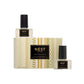 Two bottles from the Nest Birchwood Pine Collection wall diffuser refills are displayed next to their patterned box, capturing a winter forest scent, all set against a clean white background.