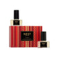 The Nest NEST Holiday Collection diffuser refill set includes two bottles in a festive red and gold box—ideal for enhancing your space with the signature holiday scent.