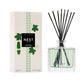Nest's Cucumber & White Sage Scent Collection reed diffuser is shown with green illustrated packaging and a clear glass bottle with black reeds.