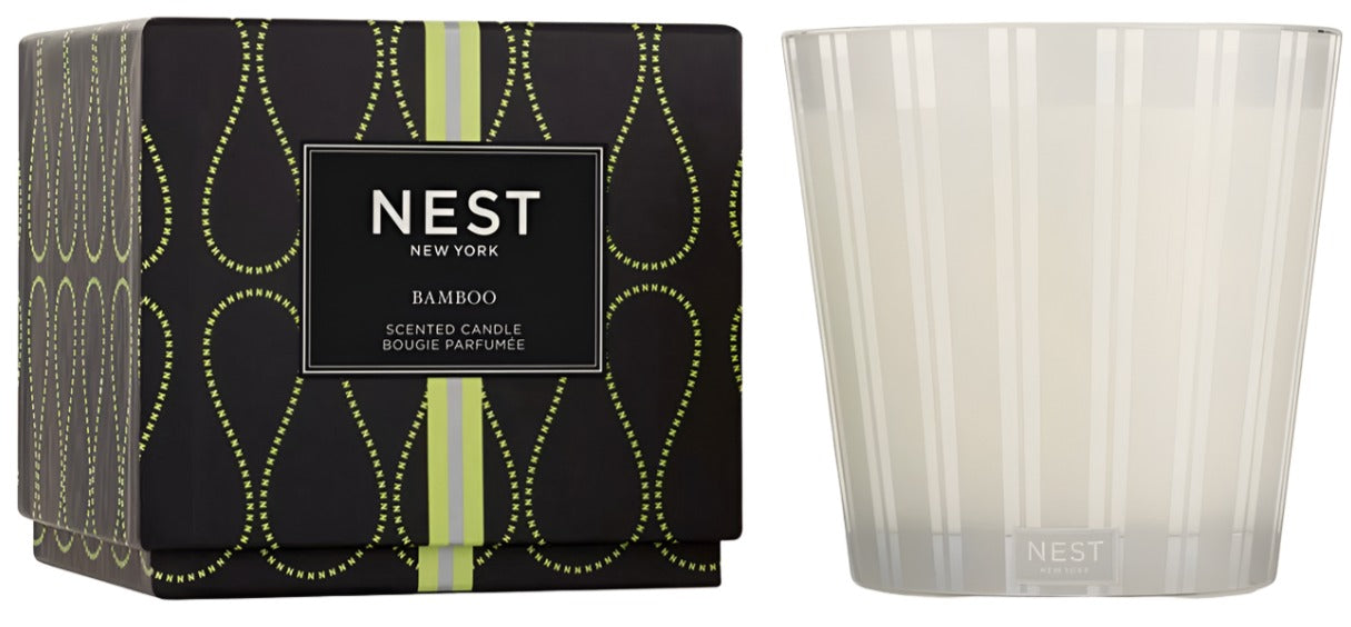 Two products from Nest: on the left, a decorative box featuring a NEST Bamboo Votive Candle, and on the right, a transparent glass candle holder with the brand's logo.