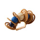 The Calypso Napkin Ring by Kim Seybert features woven rattan circular loops and hand-dyed wooden beads in blue, cream, and dark blue—perfect for beach table decor or adding a playful touch to your setting.
