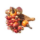 A Kim Seybert Cornucopia Napkin Ring woven in the shape of a horn and decorated with faux pumpkins, berries, leaves, and a pinecone.