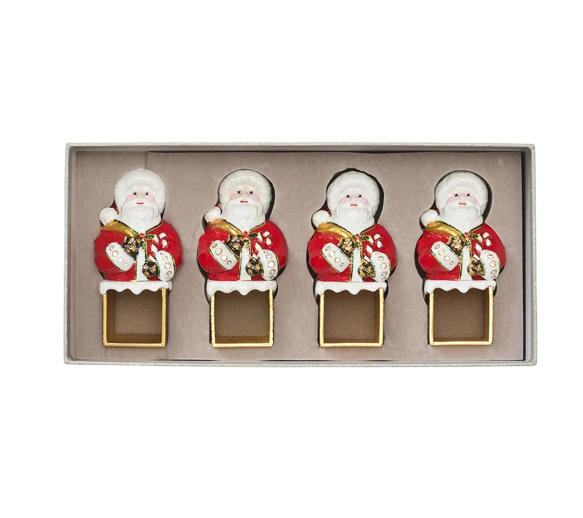 A gift box containing four Kim Seybert Santa Napkin Rings.
