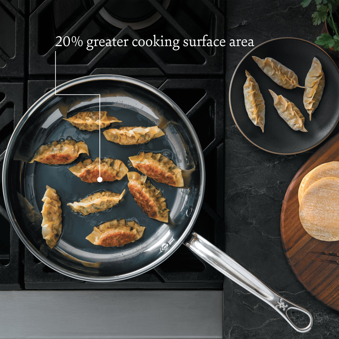 The Hestan NanoBond Titanium Ultimate Cookware 10-Piece Set offers a 20% greater cooking surface area, perfect for preparing dumplings and more with advanced NanoBond technology.