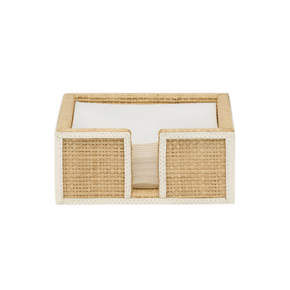 A rectangular napkin holder from the Blue Pheasant Gable Natural/White Barware Collection, featuring a beige and white design and holding a stack of white napkins.