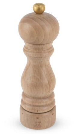 Peugeot's expertise is evident in this Peugeot Paris Natural Wood Mill Salt and Pepper Collection, featuring a rounded top and adjustable grinding knob against a white background.