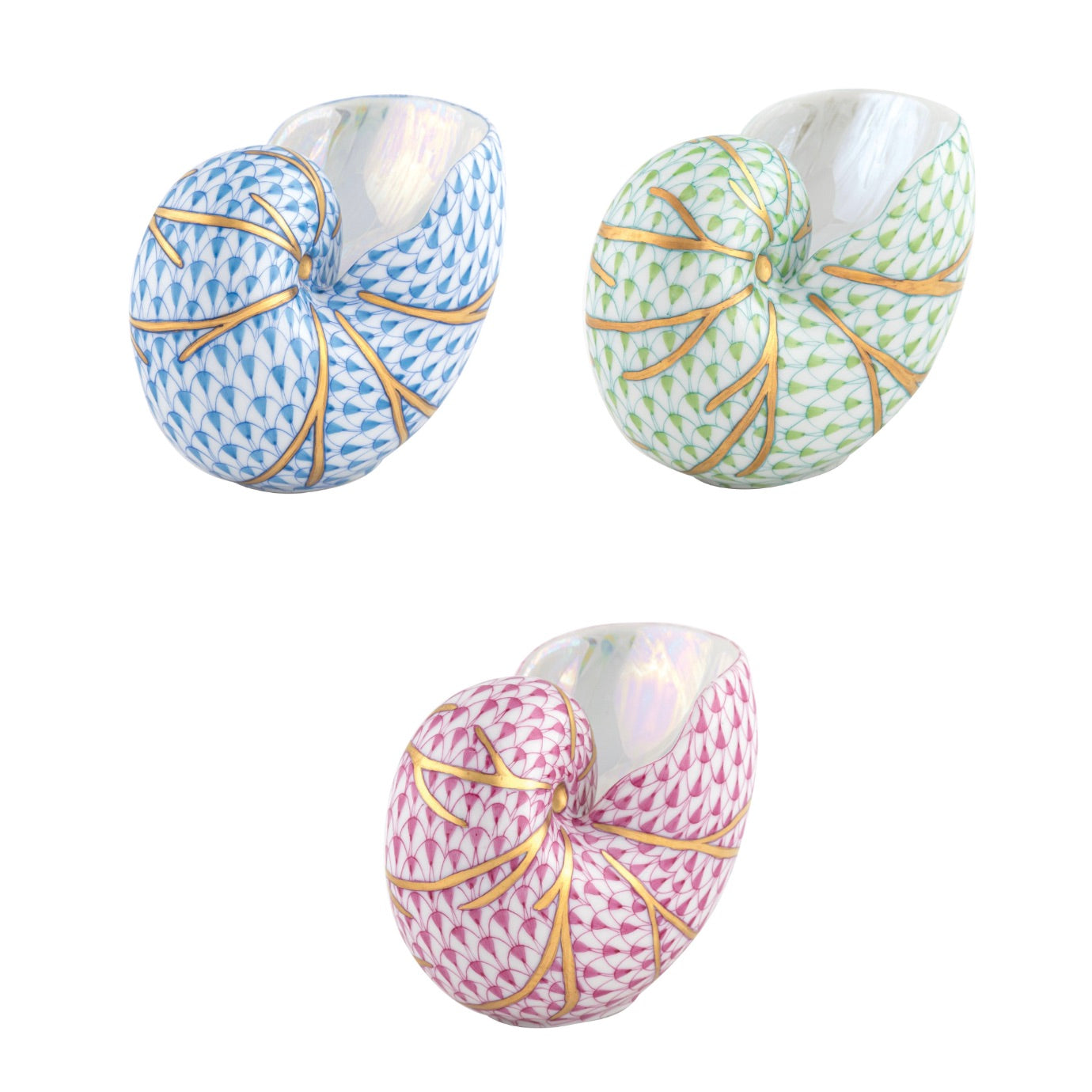 Herend’s Small Nautilus Shell vases feature blue, green, and pink geometric patterns with gold accents, each hand painted to showcase artistic craftsmanship on a white background.