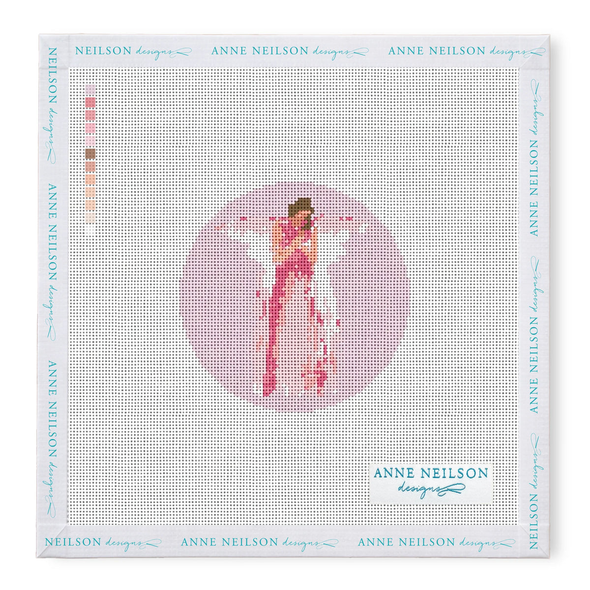 Needlepoint Kits by Anne Neilson: stitch-printed canvas of a pink-clad angel with wings on a circle, color palette left, Anne Neilson branding around the border.
