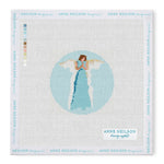 The Anne Neilson Needlepoint Kits feature an angel in a blue dress with wings on a light blue round canvas; beginner-friendly with color key included.