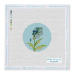 Needlepoint Kits by Anne Neilson: Blue and green floral circle canvas with color key and branding—perfect for beginner stitchers.