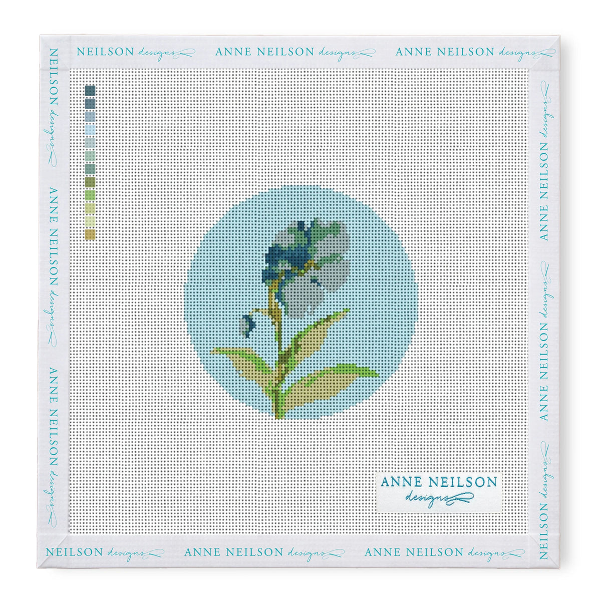 Needlepoint Kits by Anne Neilson: Blue and green floral circle canvas with color key and branding—perfect for beginner stitchers.