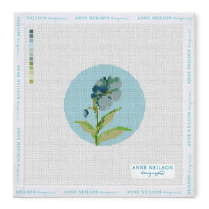 Needlepoint Kits by Anne Neilson: Blue and green floral circle canvas with color key and branding—perfect for beginner stitchers.