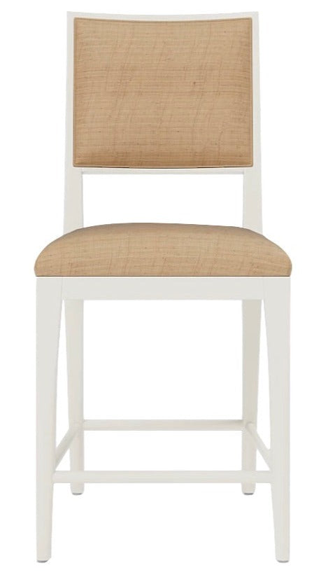 Introducing the Nelton Dining Chair by Made Goods: a modern masterpiece featuring a white wood frame and four sturdy legs. Crafted from oak, it boasts a natural raffia cushioned seat and backrest, ensuring both style and comfort.
