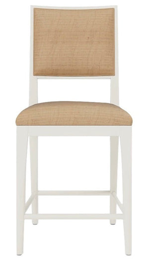 Introducing the Nelton Dining Chair by Made Goods: a modern masterpiece featuring a white wood frame and four sturdy legs. Crafted from oak, it boasts a natural raffia cushioned seat and backrest, ensuring both style and comfort.