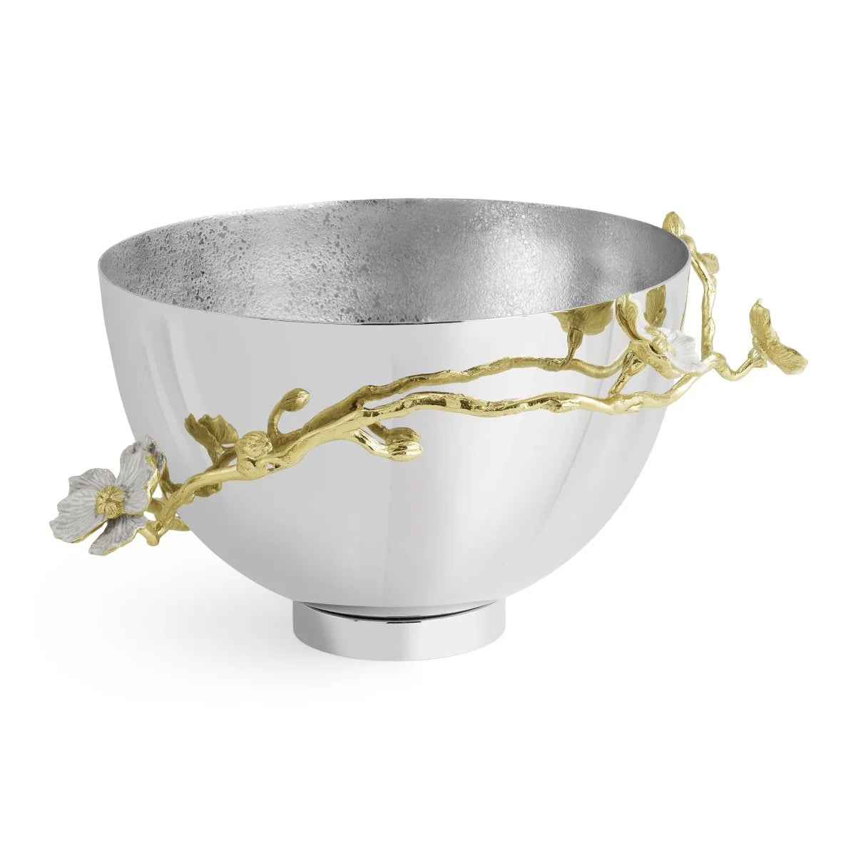 This silver metal bowl from the Michael Aram Orchid Serveware Collection features a textured interior and a decorative gold branch with white flowers, highlighting the collection's timeless allure and exquisite craftsmanship.