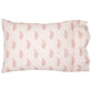 The Nirvi Lotus Bedding Collection by John Robshaw features a rectangular pillowcase with pink and green floral block print and subtle stripes on a white background.