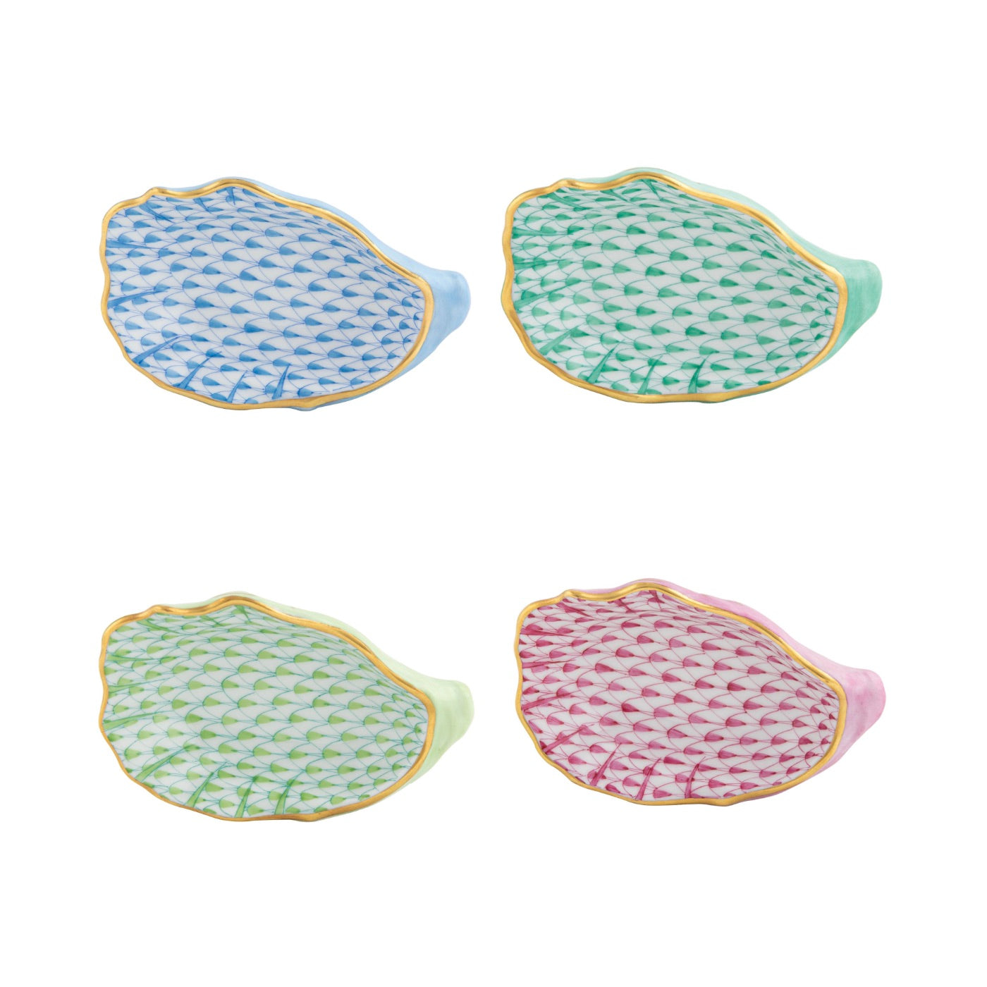 The Herend Oyster Shell set features four ceramic plates, each hand-painted in blue, green, pink, and light green with gold edging, echoing classic Herend porcelain designs and arranged on a white background.