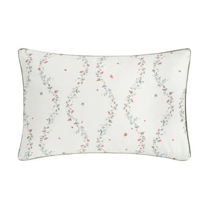 The Botanical Berries Bedding Collection by Gooselings features a rectangular white children’s pillow with a floral vine pattern of red and blue berries, finished with dark piping—ideal for sweet dreams.