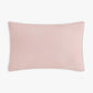 The Gooselings Bows & Butterfly Kisses Toddler Pillow is a rectangular, light pink pillow with a smooth surface, ideal for bedtime and sweet dreams, displayed against a plain white background.