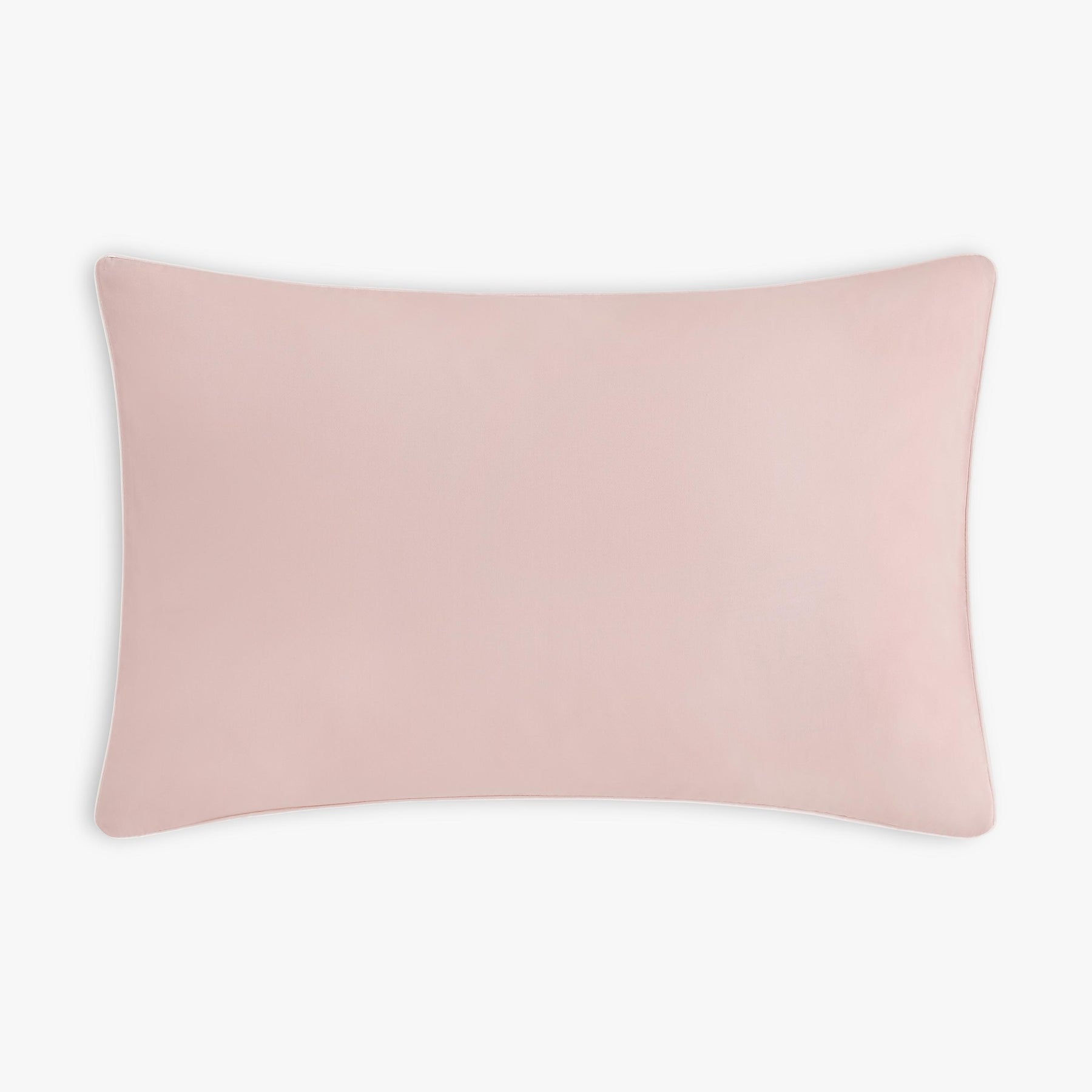 The Gooselings Bows & Butterfly Kisses Toddler Pillow is a rectangular, light pink pillow with a smooth surface, ideal for bedtime and sweet dreams, displayed against a plain white background.