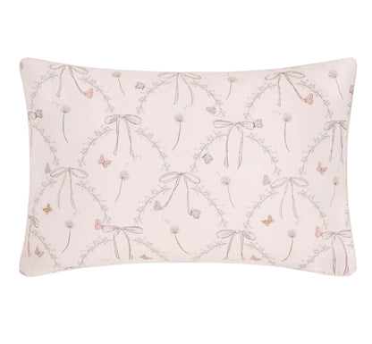 The Gooselings Bows & Butterfly Kisses Toddler Pillow features a pale pink background with delicate bows, flowers, and butterflies in pastel shades—perfect for sweet dreams at bedtime.