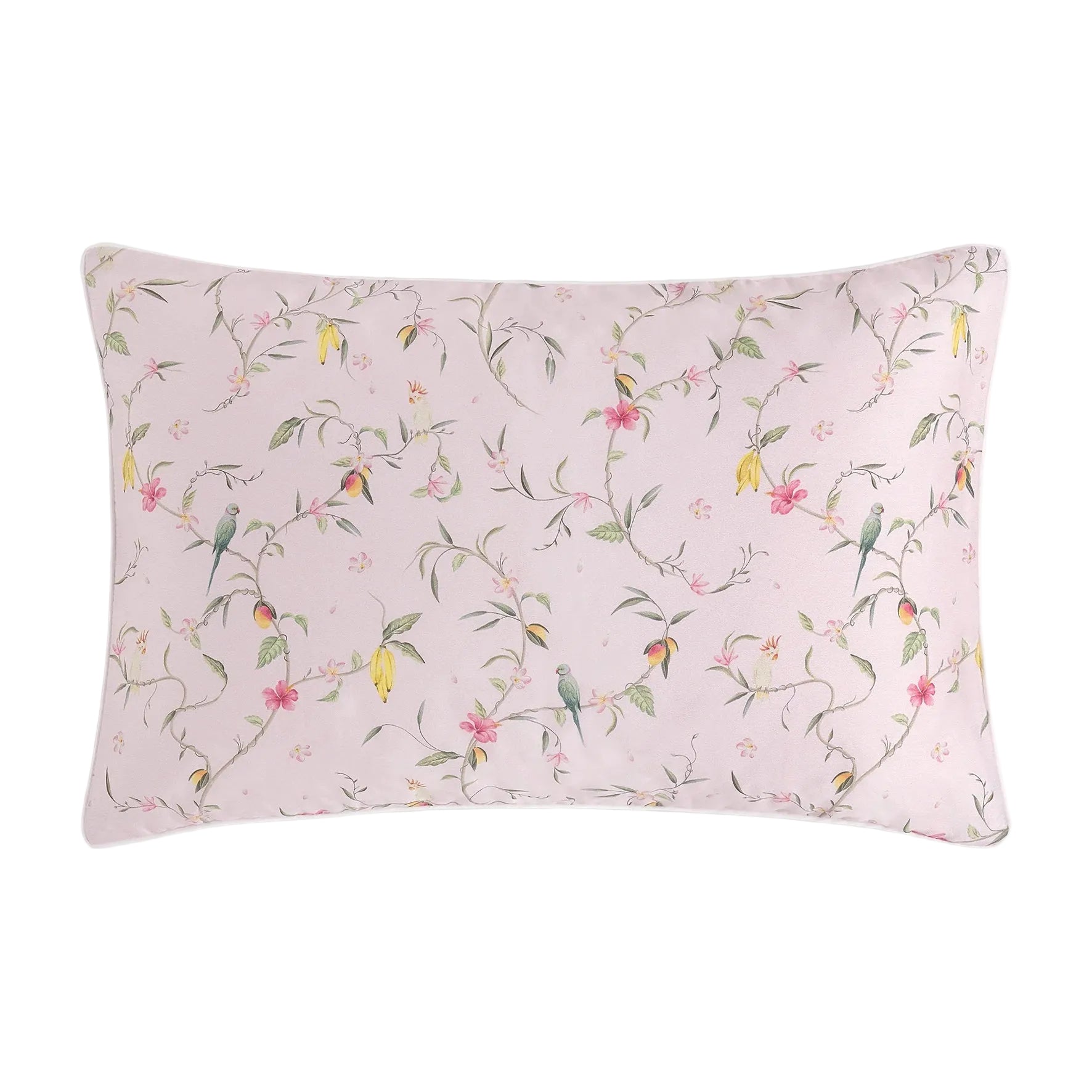 The Gooselings Dreaming of Paradise Bedding Collection features a rectangular children's pillow with a pale pink background, decorated with birds, branches, and pink and yellow flowers—perfect for sweet bedtime dreams.