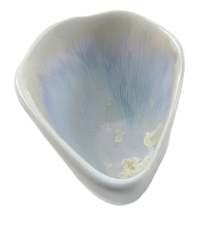 The Small Sauce Bowl Collection by AE Ceramics features handmade white bowls with a subtle blue gradient and light decorative streaks, perfect for adding coastal charm to your tableware.