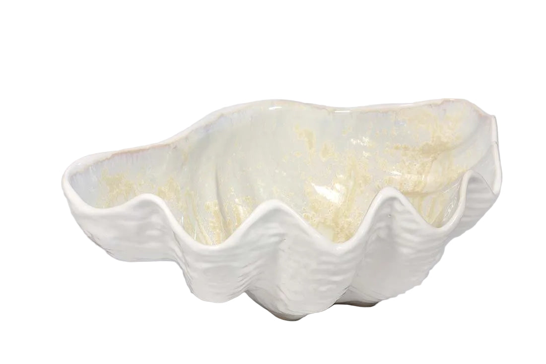 The Large Clam Bowl Collection by AE Ceramics features a handmade, glossy white ceramic bowl with wavy edges and a clam shell shape—perfect for adding elegant coastal style to your tableware. Shown on a plain white background.