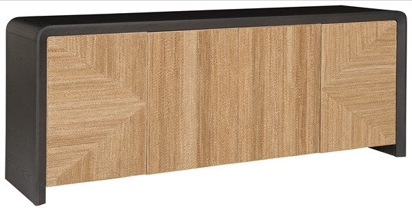 A modern wooden sideboard crafted from oak solids and veneers, with a black top and base, featuring three large cabinet doors adorned with a chevron pattern, the Form Buffet by Vanguard.