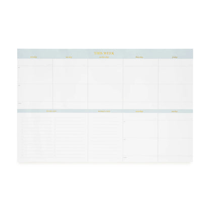 The Sugar Paper Desktop Family Planning Pad features large-format sections for each day of the week, notes, and to-do lists. Each day is labeled with yellow text at the top of its column, and a dedicated daily menu section provides additional organization for your meals.