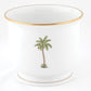 Herend Palm Tree Decor Collection: White porcelain cup with a gold rim and hand-painted palm tree design—an elegant accent for any setting.