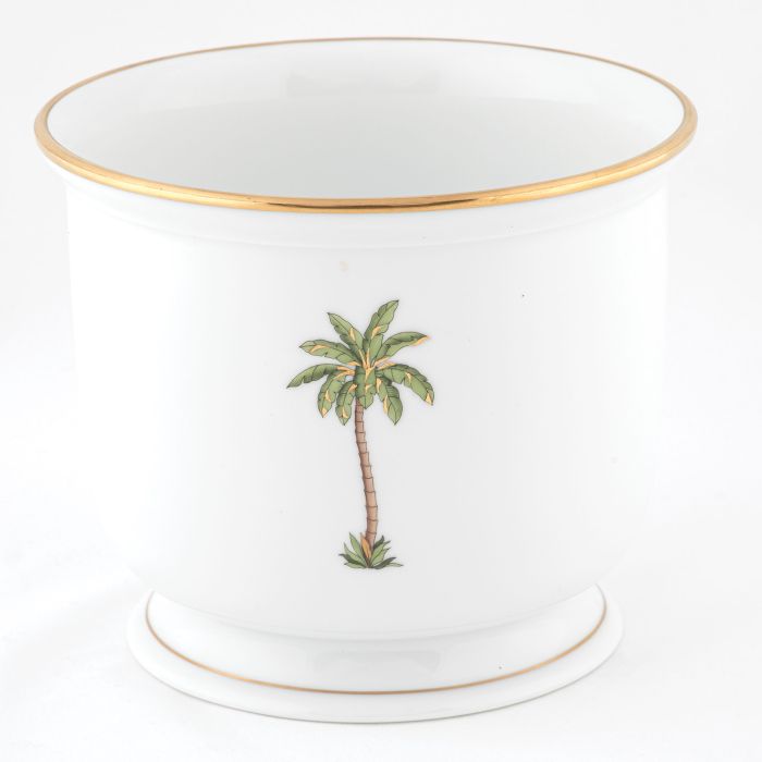 Herend Palm Tree Decor Collection: White porcelain cup with a gold rim and hand-painted palm tree design—an elegant accent for any setting.