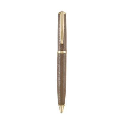 The Graphic Image Leather Wrapped Pen Collection features brown leather-wrapped ballpoint pens with gold accents and a pocket clip, shown on a white background—a stylish gift for writers.