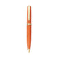 The Leather Wrapped Pen Collection by Graphic Image features an orange textured leather ballpoint pen with gold accents and a clip—a stylish gift for any writer, pictured against a white background.