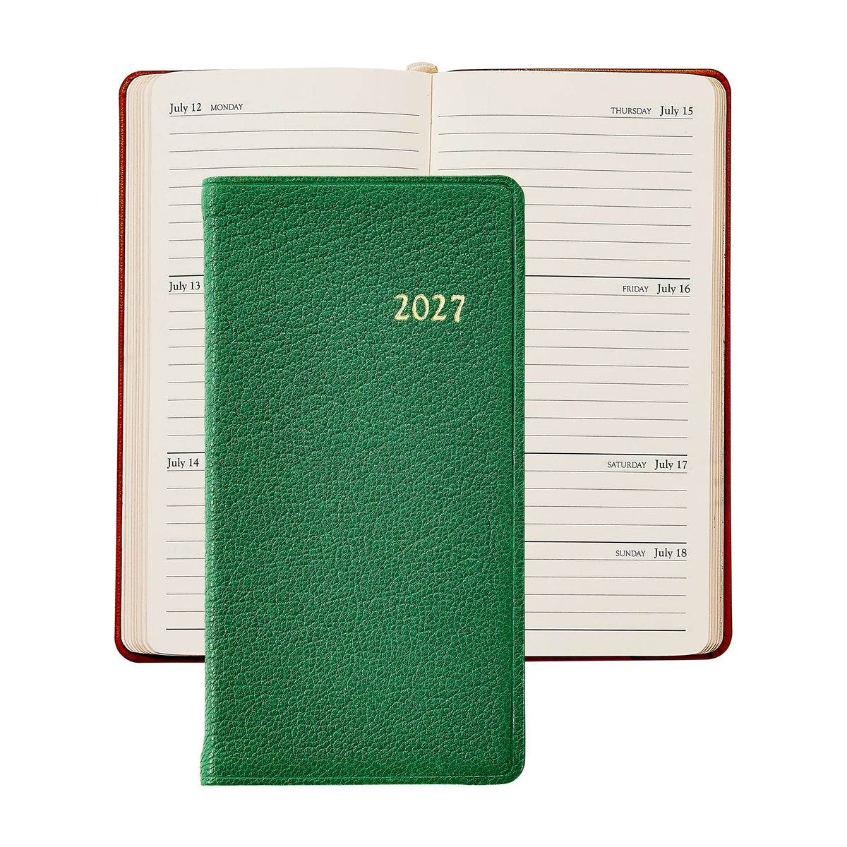 A green 2027 Pocket Datebook by Graphic Image is placed on top of an open weekly diary displaying the dates from July 12 to July 18.