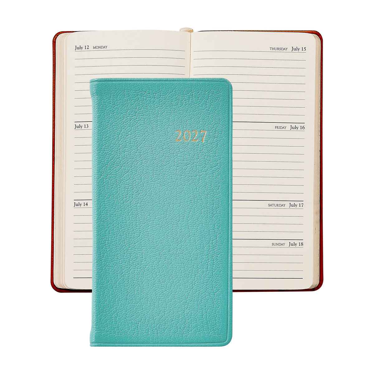 A turquoise 2021 planner with a textured cover lies on top of an open weekly planner displaying the dates July 12 to July 18, alongside the Graphic Image 2027 Pocket Datebook—a compact personal pocket journal perfect for jotting down daily notes and reminders.