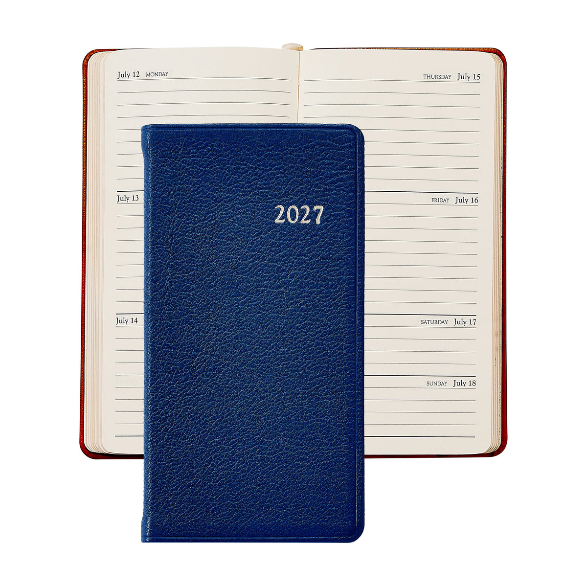 A Graphic Image 2027 Pocket Datebook in blue, ideal for use as a personal pocket journal, is shown resting on an open weekly calendar displaying July 12 to July 18.