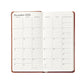 The Graphic Image 2026 Pocket Journal Planner Collection features a weekly layout for December with holidays like Christmas and Chanukah marked at the bottom of the right page.