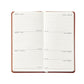 The Graphic Image 2026 Pocket Journal Planner Collection features a Smyth sewn, numbered pocket journal open to July 15–21, with lined daily sections.