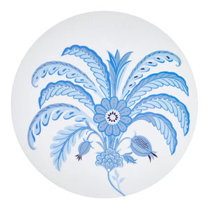 Round white plate with a blue floral and leaf design pairs perfectly with the Addison Ross Palm Beach Placemat for an elegant and elevated table setting.