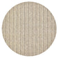 A round beige rug with a subtle herringbone pattern, made from durable polyvinyl for easy care—perfect for spring and summer dining and designed to coordinate with your favorite Kim Seybert Herringbone Placemat.