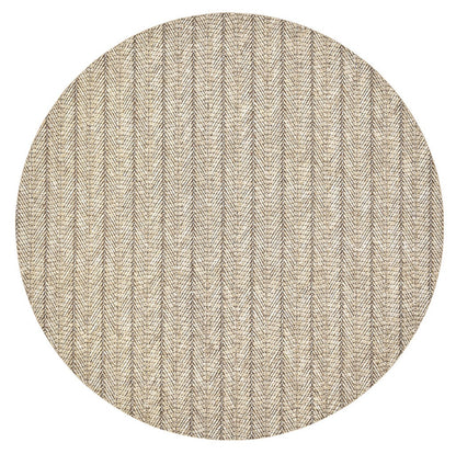 A round beige rug with a subtle herringbone pattern, made from durable polyvinyl for easy care—perfect for spring and summer dining and designed to coordinate with your favorite Kim Seybert Herringbone Placemat.
