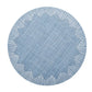 The Kim Seybert Dream Weaver Placemat is a round, blue placemat with a geometric starburst design and white-stitched edges—ideal for summer entertaining and stunning when seen from above.