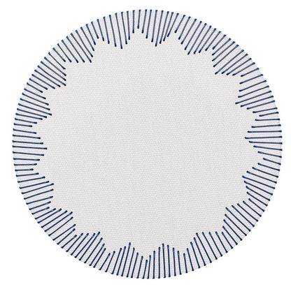 The Kim Seybert Dream Weaver Placemat features a circular white design with a stitched dark blue border and starburst blue radial lines—ideal for adding woven style to summer entertaining.