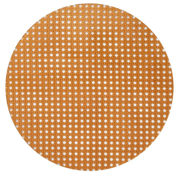 Circular Kim Seybert Reed placemat with a uniform intertwining pattern.